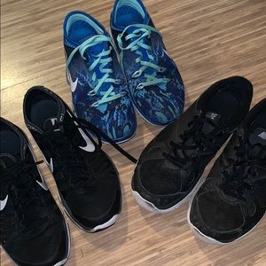 Three pairs of Nike shoes